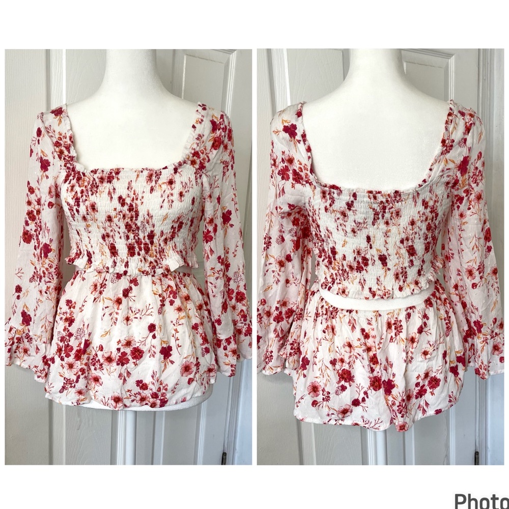 Bloomfield peplum open back floral top